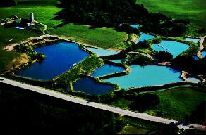 Beautifully designed ponds shining with a blue glow thanks to Davies "Aqua Blue".